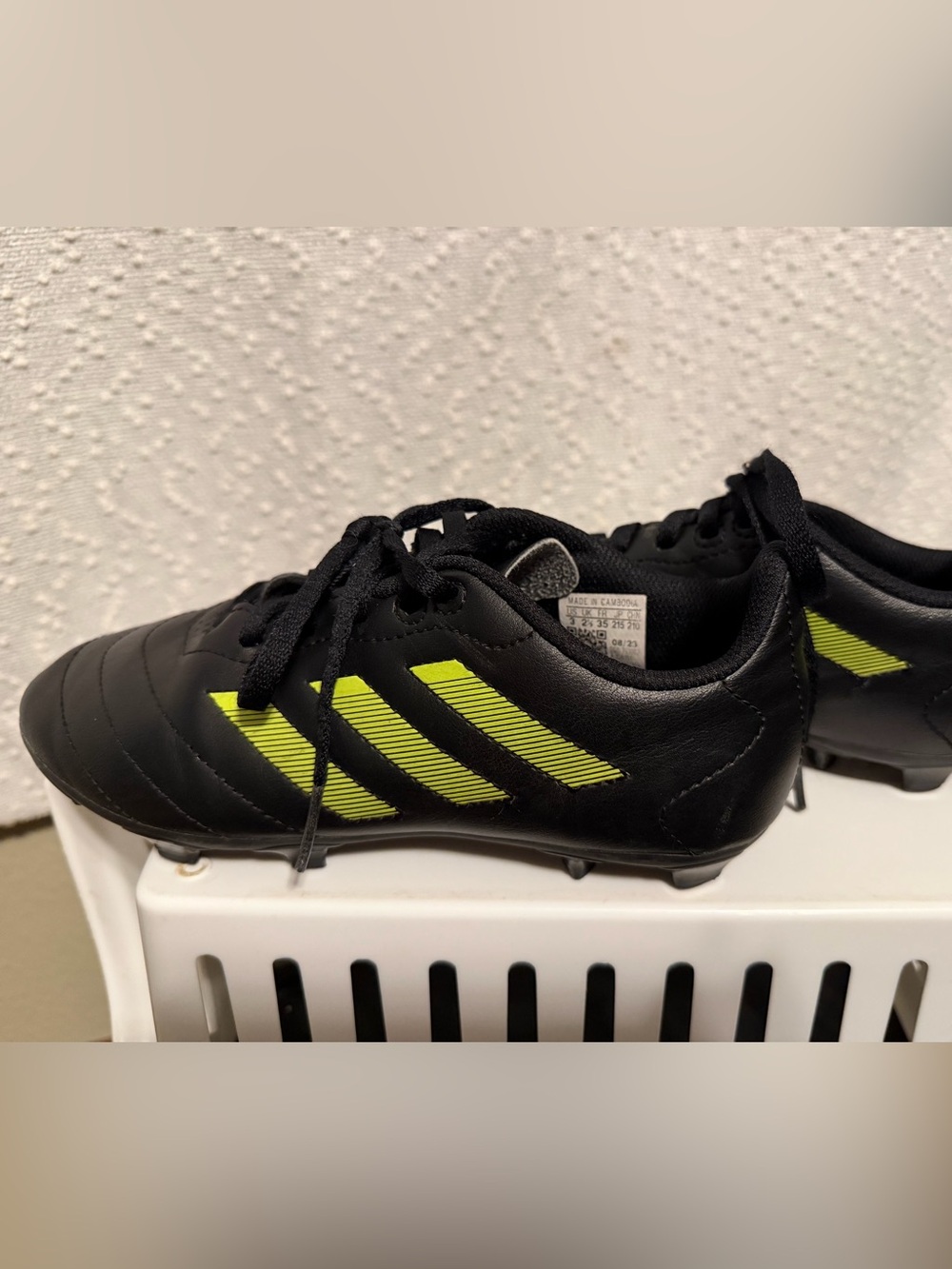 adidas Kids Black Soccer Cleats with Neon Stripes